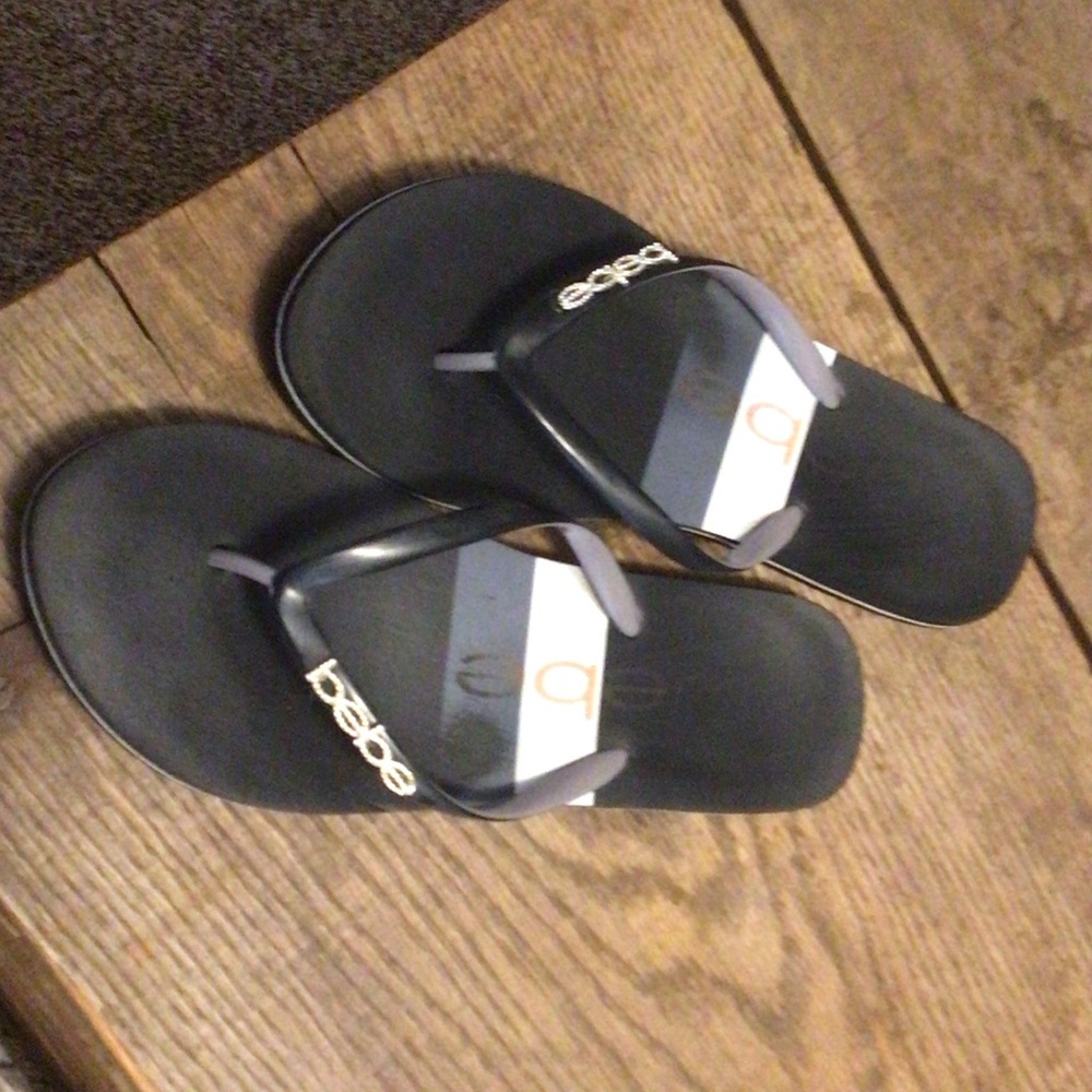 Bebe Black and White Flip Flops